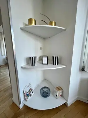 a white shelf with a light on top of it at Bellevue - Grand appartement pour 5 sur les quais de la Meuse in Liège