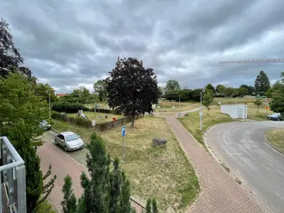 a car parked on the side of a road at Apart Loten in Eupen