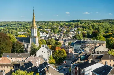 an aerial view of a small town with a church at Apart Loten in Eupen