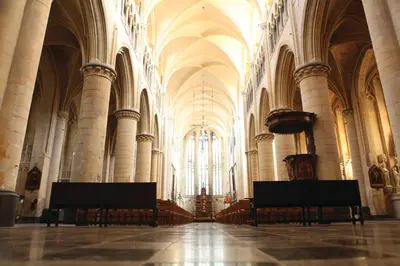a large room with chairs in a large cathedral at Viator Holidayhome in Tongeren