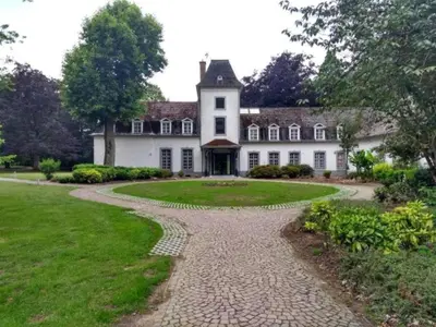 a driveway leading to a large white house at Hengelhoef Berk 5 in Houthalen-Helchteren