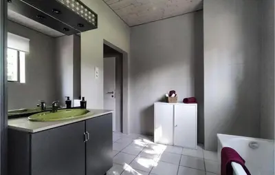 a bathroom with a green sink and a tub at Pet Friendly Home In As With Wifi in As