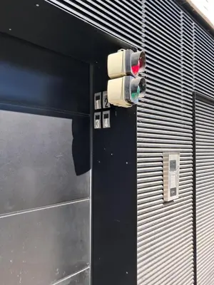 a traffic light on the side of a building at La Bohème in Liège