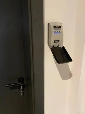 a close up of a door with a soap dispenser at Les Quais de la Vesdre in Verviers
