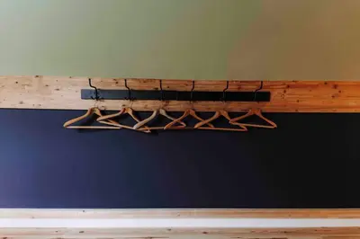 a wooden beam hanging on a wall at L’écrin vintage - Hors Château & Marches de Bueren in Liège
