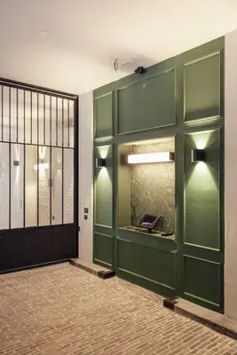 a room with green doors and a window at Getaway Liège in Liège