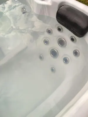 a sink with aaucet and water in it at Le Gîte du Moulin - Modernity & Elegance - jacuzzi in Oupeye