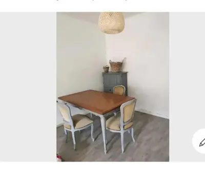 a dining room table with two chairs and a table at Vintage house ViVa in Leopoldsburg