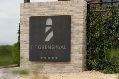 a sign for the de greenwich war cemetery at NIEUW De Grenspaal ZUID 2slpk - 4P - SAUNA - LAADPAAL in Riemst