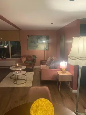 a living room with a couch and a table at Lacuna STILLA by Sonnevijver Residences in Lanaken