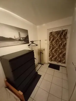 a living room with a tv and a painting on the wall at Ap4 Nature Ardennes Economy class apartment in La Calamine