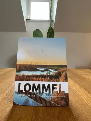 a book sitting on top of a table at Maison Isa in Lommel