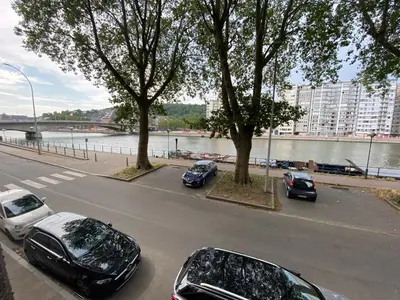 a group of cars parked on the side of a road at 