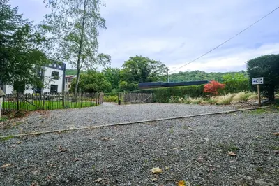 an old train track in front of a fence at Gîte La Vieille Ferme Chaudfontaine et son jacuzzi in Chaudfontaine
