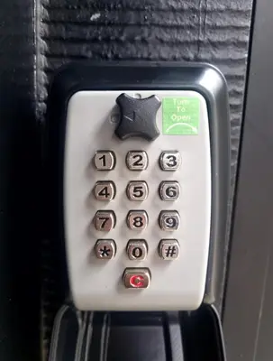 a close up of a fax machine with a button at Aslyra 