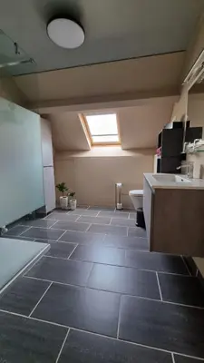 a room with a bathroom with a sink and a toilet at MARINA in Houthalen-Helchteren