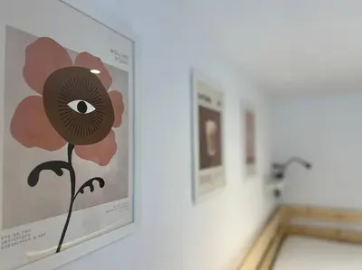 a picture of a painting of a flower on a wall at Havre des Anges - Pont de Fragnée, Guillemins in Liège