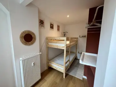 a small room with a bunk bed in it at Havre des Anges - Pont de Fragnée, Guillemins in Liège