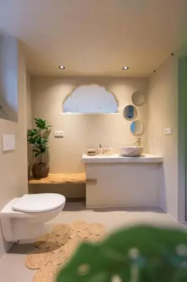 a bathroom with a toilet and a sink at Ontspan huisje: wellness in de natuur in Lanaken