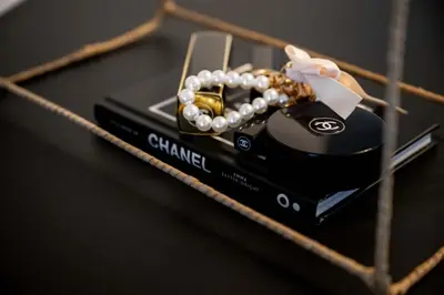 a cell phone with a pearl necklace on it at Maison Idyllique in Bree