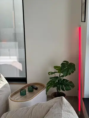 a living room with a plant and a bed at PentHouse 5.01 in Liège