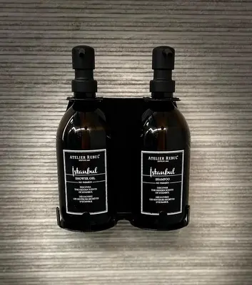 two bottles of honey sitting on top of a table at Garden Street Lommel - The Green Haven in Lommel