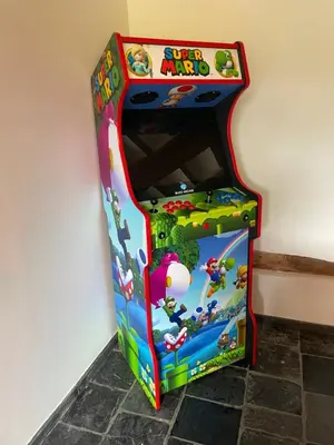 a childrens activity table with a toy machine at Gite 13 personnes in Battice