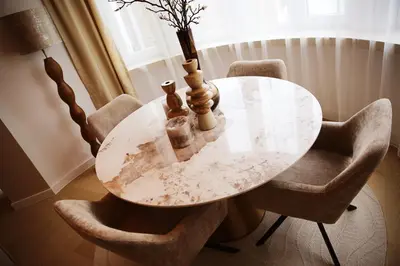 a dining table with two bottles on top of it at Le 118 Guillemins, avec Parking in Liège