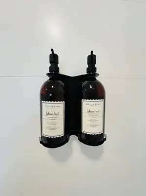 two bottles of wine on a white background at Urbanchic Opéra 2B in Liège