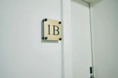 an open door with the letters ic on it at Urbanchic Appartement cosy 1B in Liège