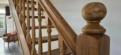 a wooden stair case in a house at Vakantiehuis Pippa in Peer