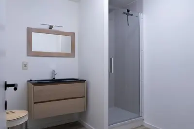 a bathroom with a shower and a sink at Lindehoeve in Heusden - Zolder