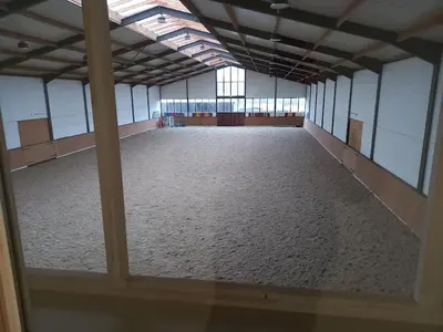 an empty room with a large room with a large floor at Lindehoeve in Heusden - Zolder