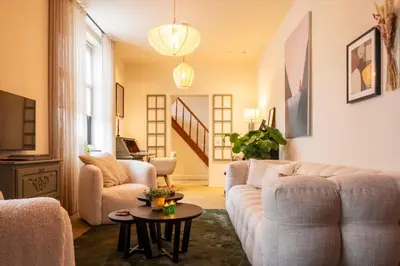 a living room with a couch and a table at Stee10 in Lanaken