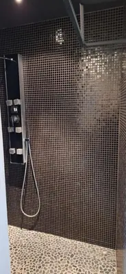 a shower stall in a bathroom with a shower at Maison Beau in Zonhoven