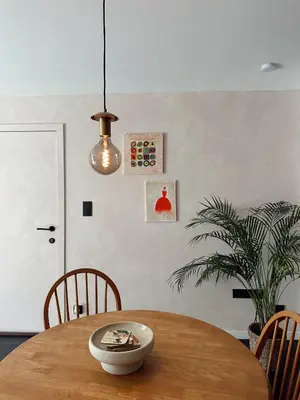 a dining room table with a bowl on top of it at Residentie Papillon in Hasselt