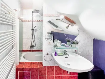 a bathroom with a sink and a bath tub at Modern Loft with 2 bedrooms near Sint Truiden in Herk-de-Stad