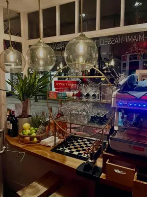 a counter with several lights and fruits on it at The House Of Jack's in Hasselt