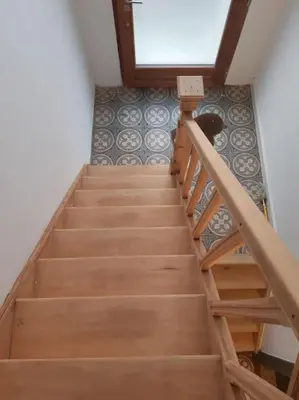 an overhead view of a staircase in a house at Atelier 27, Duplex with terrace and beautiful view in Liège