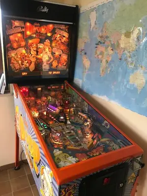 a pinball machine with a map of the world at Happiness at Vero in Verviers