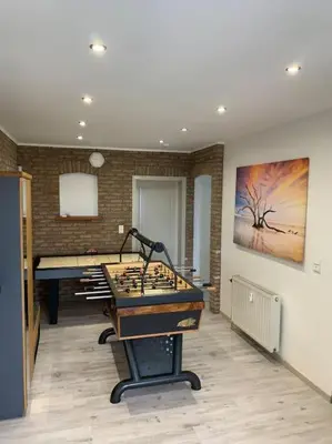 a room with a desk and a chess board in it at Eaglenest in Baelen
