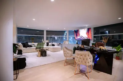 a large living room with a desk and chairs at Dream Saint Lambert in Liège