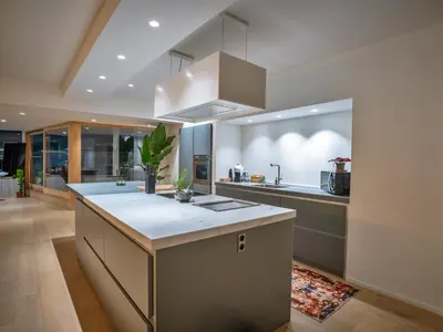 a kitchen with a large island in the middle at Dream Saint Lambert in Liège