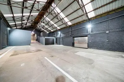 a large empty room with a brick wall at Loft36 in Herstal