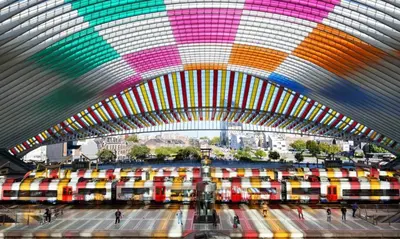 a large building with a large colorful ceiling at Miracle Luxury Property Liège Guillemins in Liège