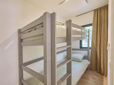 a bunk bed in a bedroom with a bunk bed in a room at Zen en Zoet in Zutendaal