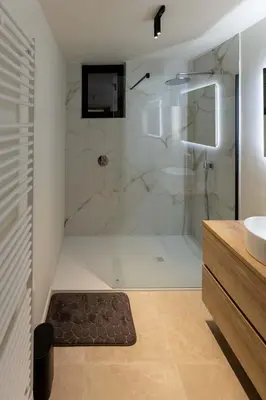 a bathroom with a shower and a sink at Villa Armande in Zammelen