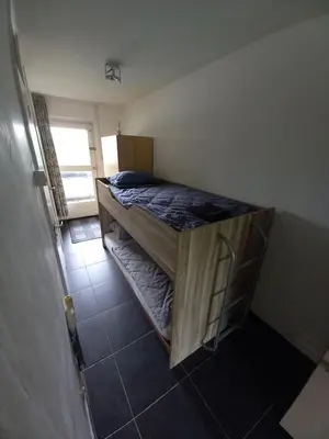 a bedroom with a bunk bed in a room at Ap57 Nature Ardennes Economy class apartment in Kelmis