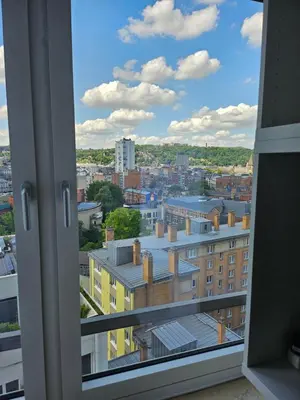 a view of a city from a window at Phocas in Liège