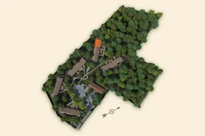 a model of a forest with a house in it at Lodge met Jacuzzi - 4 personen - Woodz Lodges in Heusden - Zolder